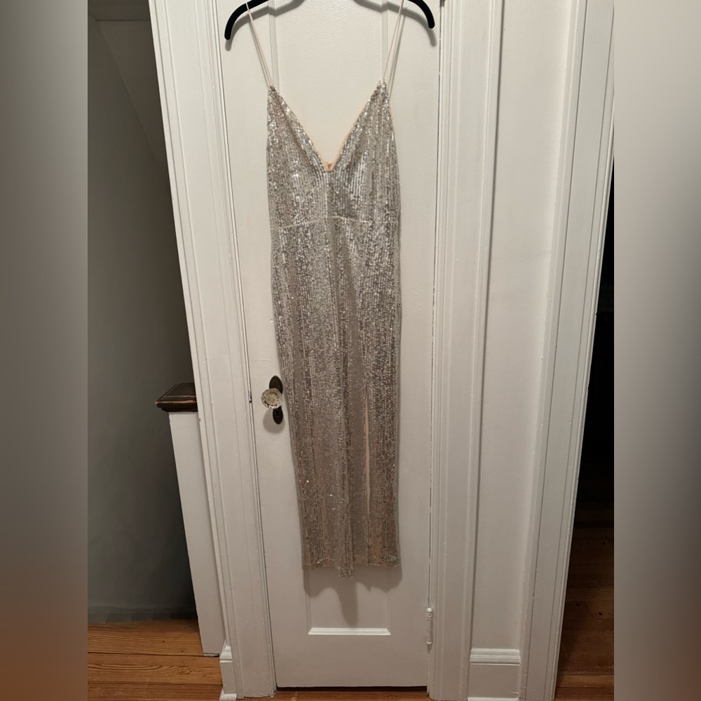 EXACTLY what I wanted for NYE just didn’t fit right. Fits more like a L.